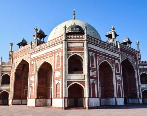 Red and white domed mausoleum in Delhi, India