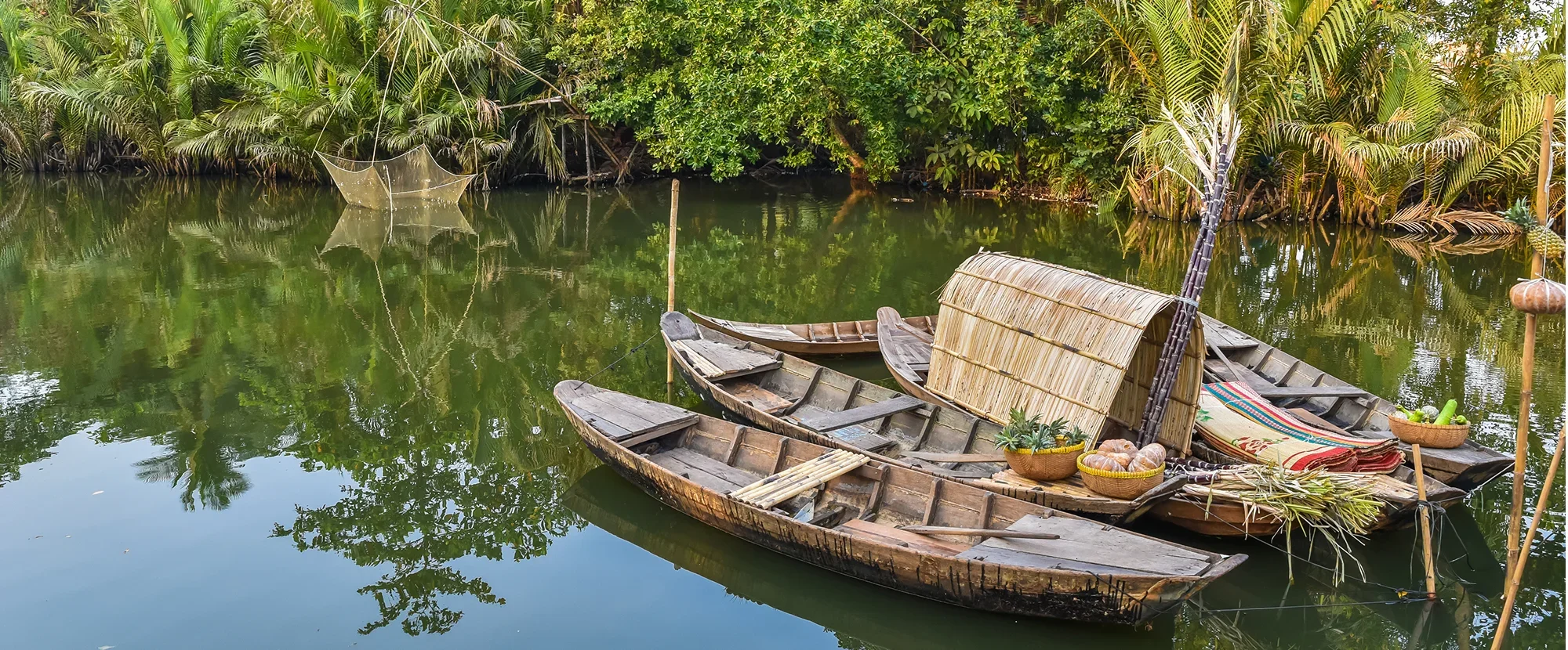 Traditional wooden boast in the Mekong Delta, Vietnam